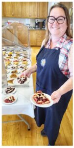 Serving pie at the Alma Optimist Club Dinner